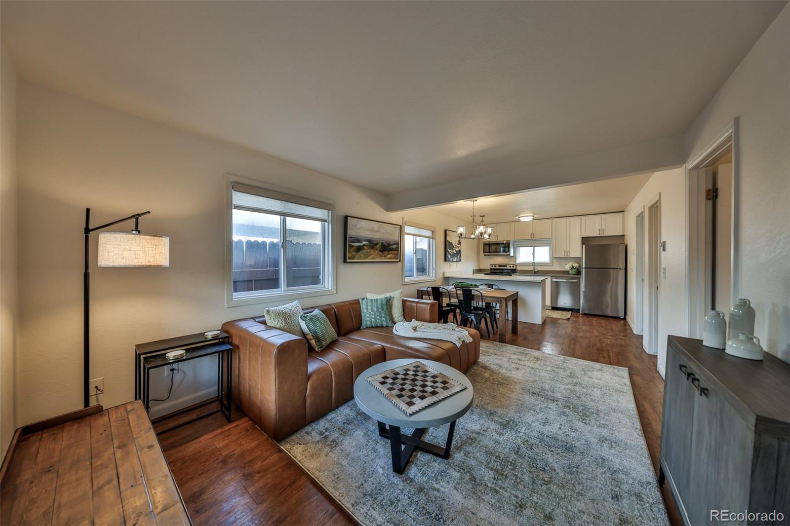 233 Fraser Avenue, Unit R1 Fraser, CO 80442 - Photo 7 of 23 a living room with furniture and a table