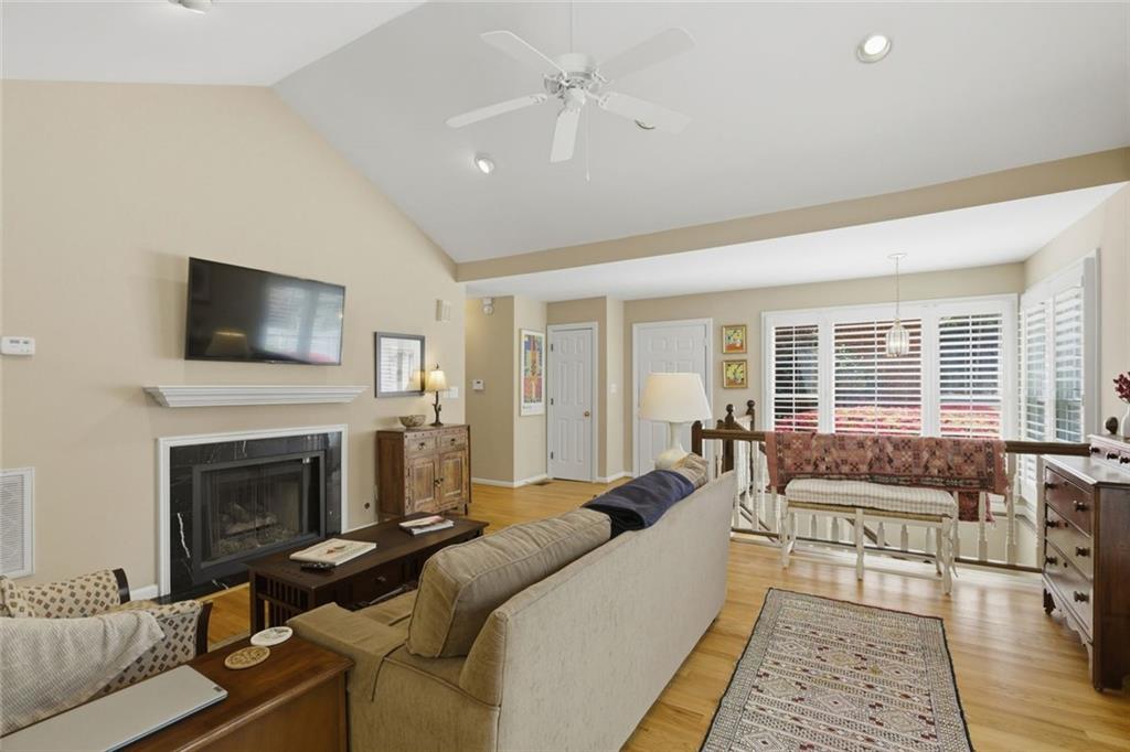3269 Embry Downs Court Atlanta, GA 30340 - Photo 10 of 38 a living room with furniture fireplace and flat screen tv
