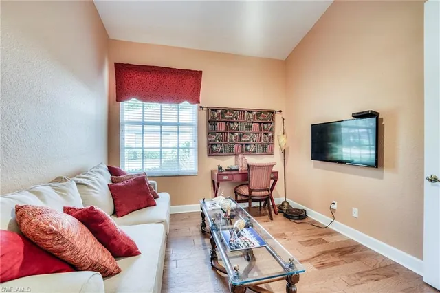 a bedroom with a bed and a cabinets