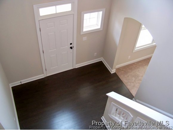 101 Caulfield Road Aberdeen, NC 28315 - Photo 9 of 19 wooden floor in an empty room