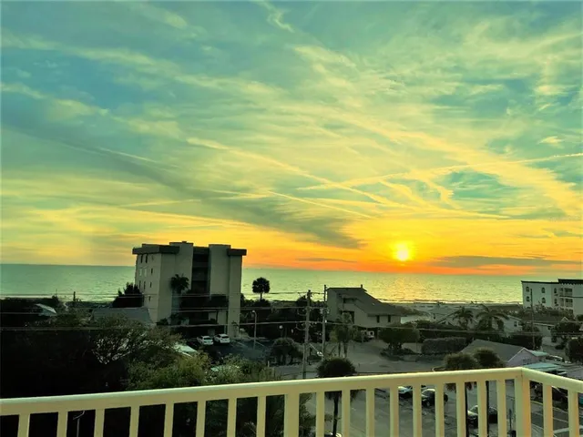 a view of a city with ocean view