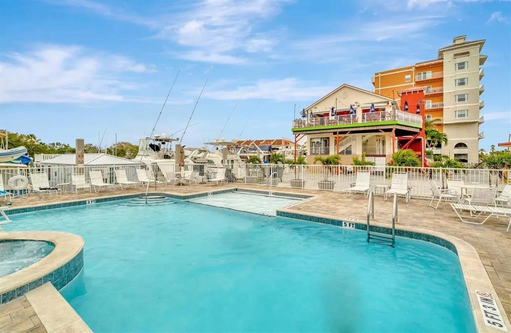 13101 Gulf Boulevard, Unit 1506 Madeira Beach, FL 33708 - Photo 4 of 15 a view of building with outdoor space
