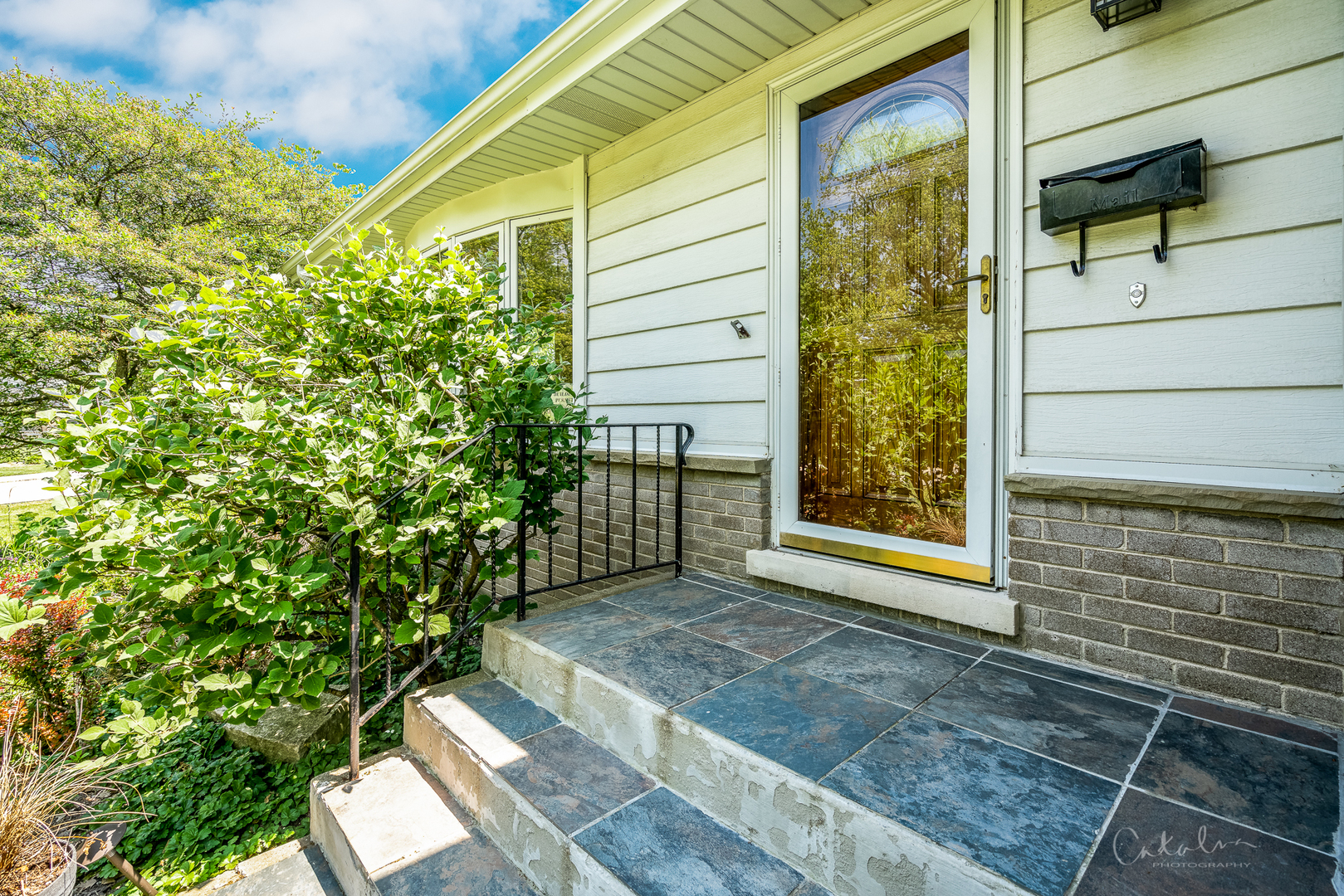 1415 Charing Cross Road Deerfield, IL 60015 - Photo 2 of 23 a view of front door of a house with a yard