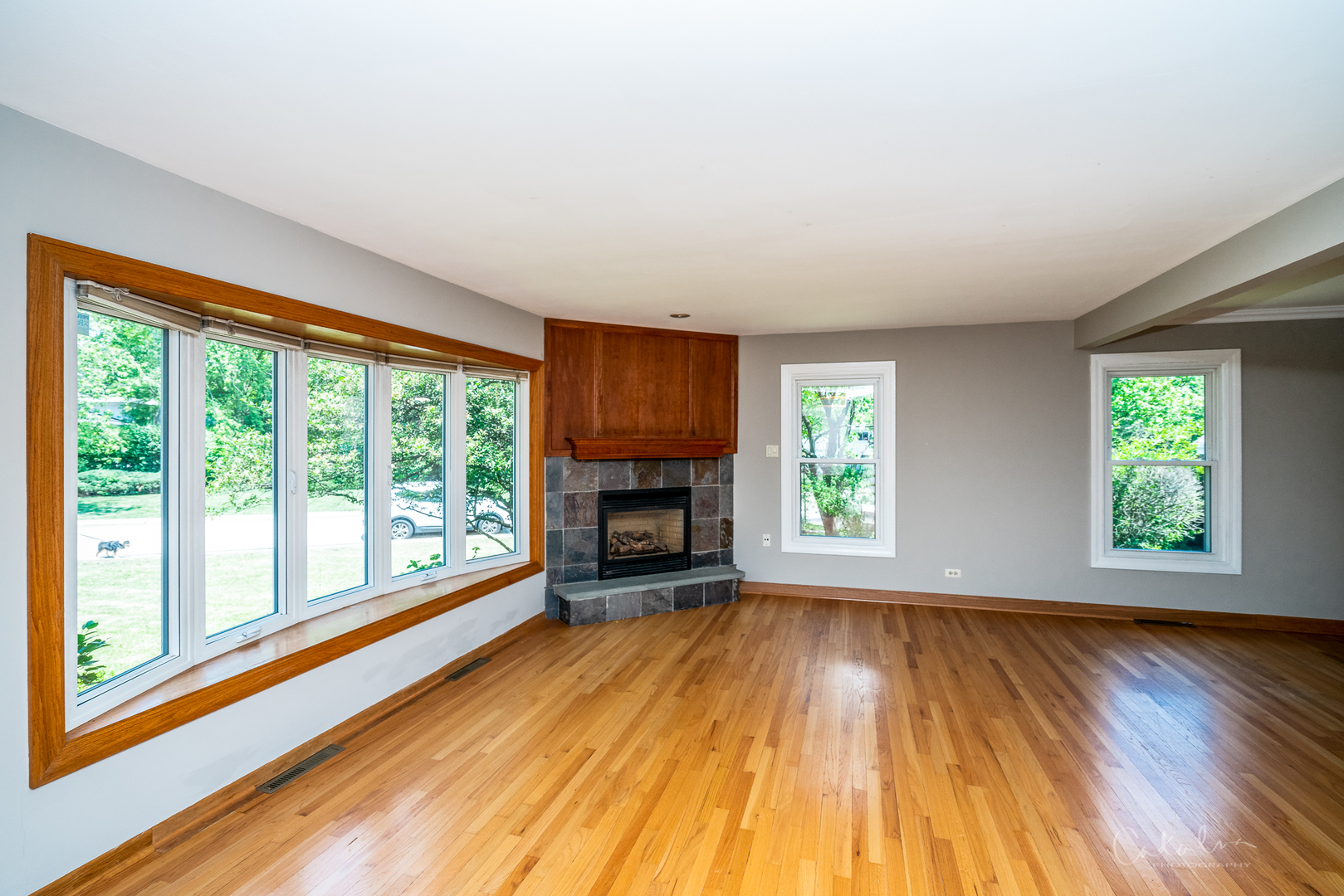 1415 Charing Cross Road Deerfield, IL 60015 - Photo 11 of 23 a view of an empty room with wooden floor and a window