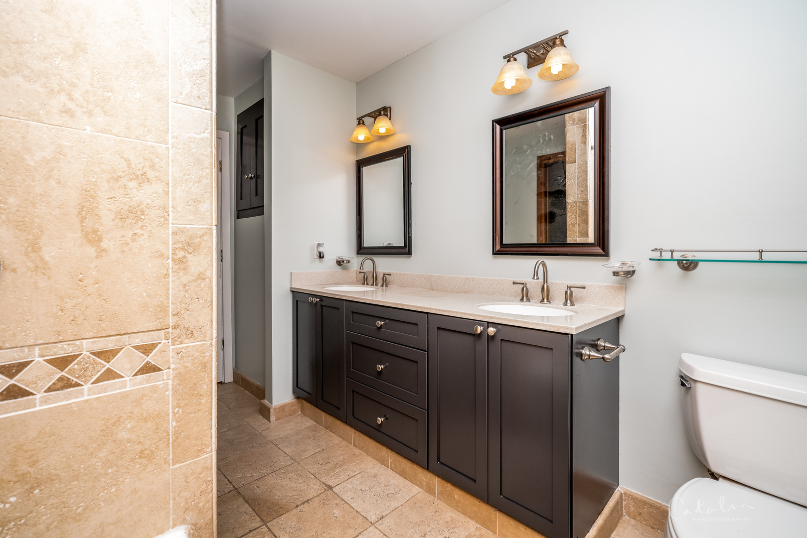 1415 Charing Cross Road Deerfield, IL 60015 - Photo 18 of 23 a bathroom with a toilet sink and mirror