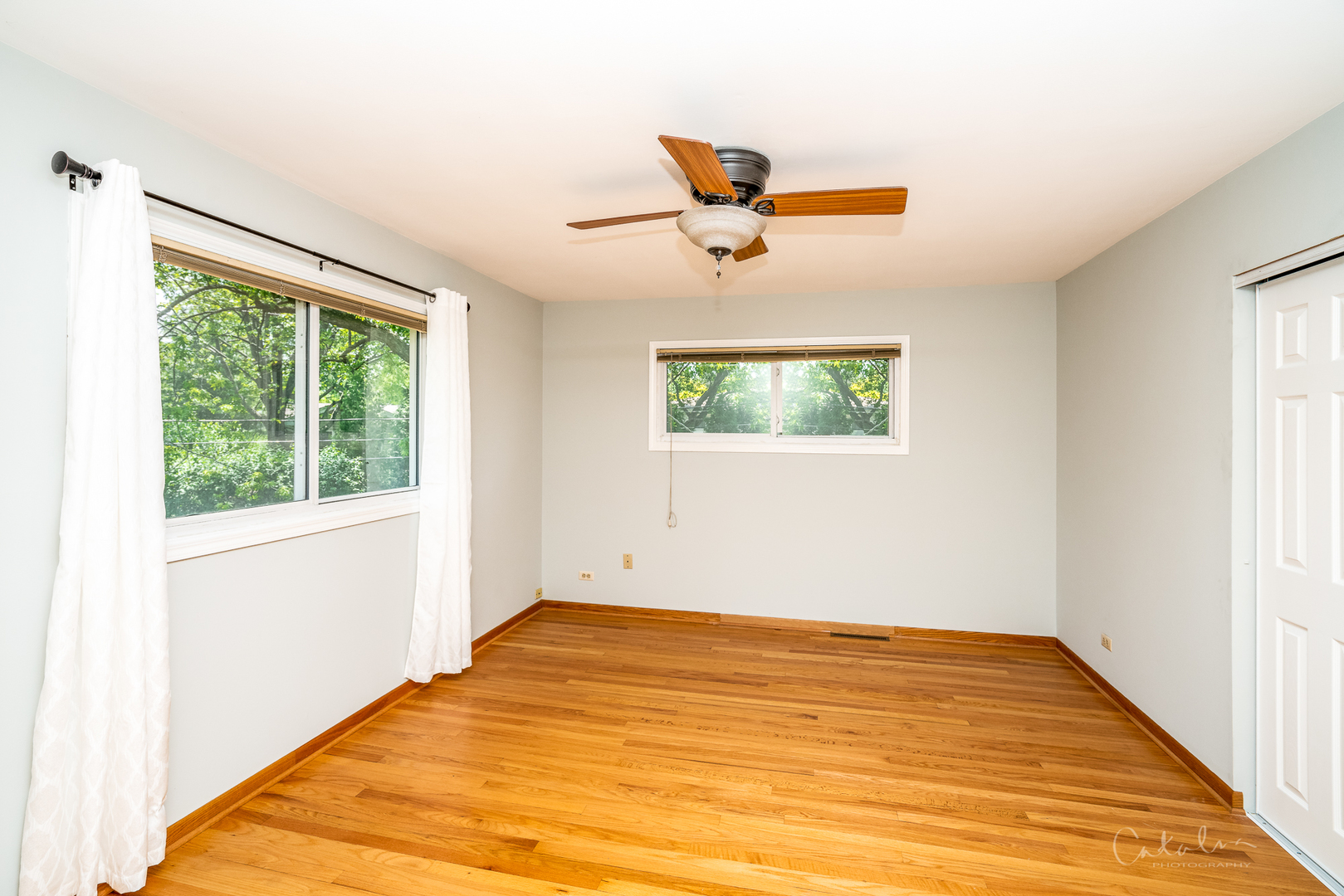 1415 Charing Cross Road Deerfield, IL 60015 - Photo 20 of 23 a view of empty room with wooden floor and fan