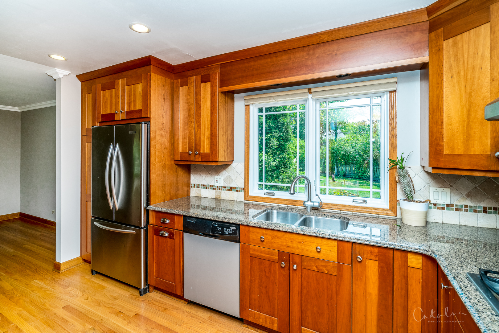 1415 Charing Cross Road Deerfield, IL 60015 - Photo 8 of 23 a view of a kitchen with a sink and dishwasher