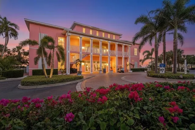 a view of a fountain in front of a house