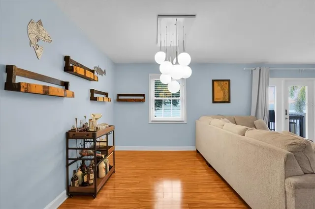 a living room with furniture and a table