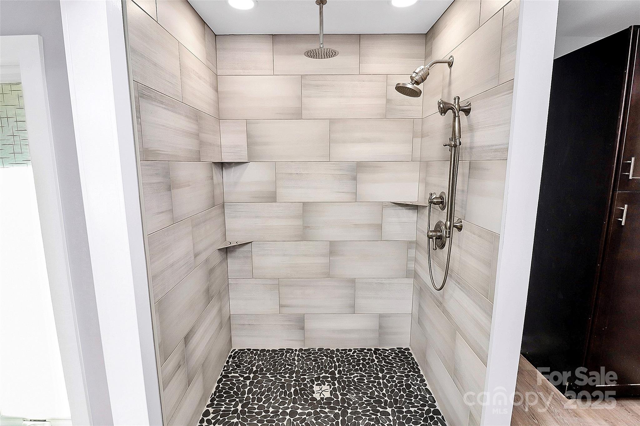 9808 Washam Potts Road Cornelius, NC 28031 - Photo 23 of 43 a bathroom with a shower