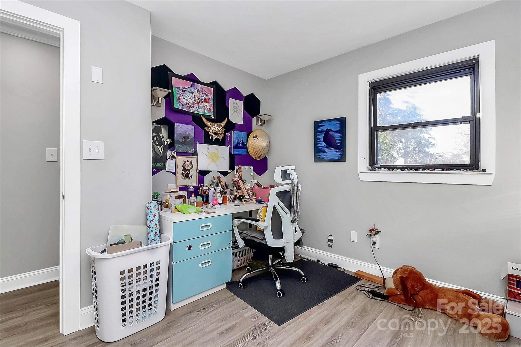 9808 Washam Potts Road Cornelius, NC 28031 - Photo 27 of 43 a view of a workspace with furniture and wooden floor
