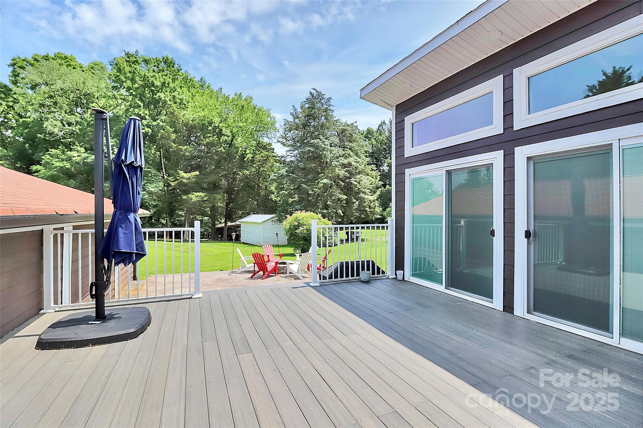 9808 Washam Potts Road Cornelius, NC 28031 - Photo 6 of 43 a view of a room with wooden floor and fence