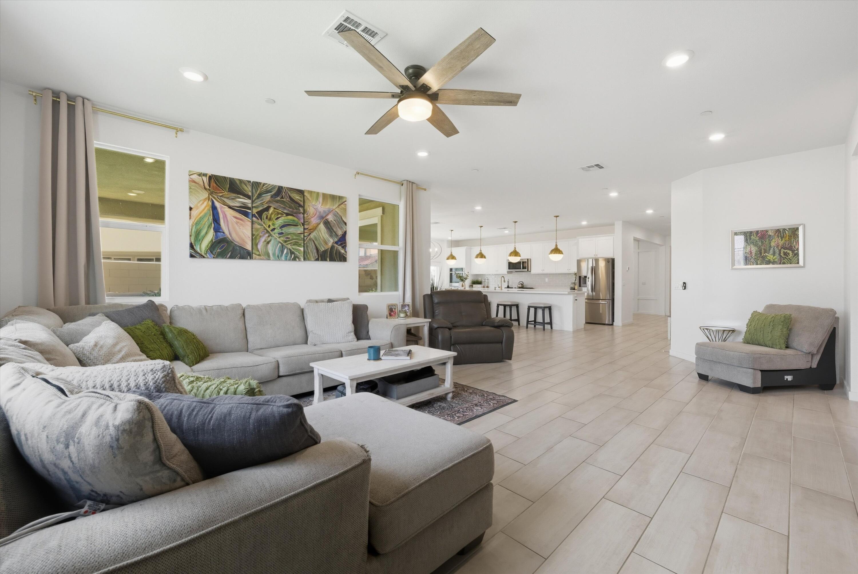 40340 Vivaldi Court Indio, CA 92203 - Photo 15 of 30 a living room with furniture and a large window