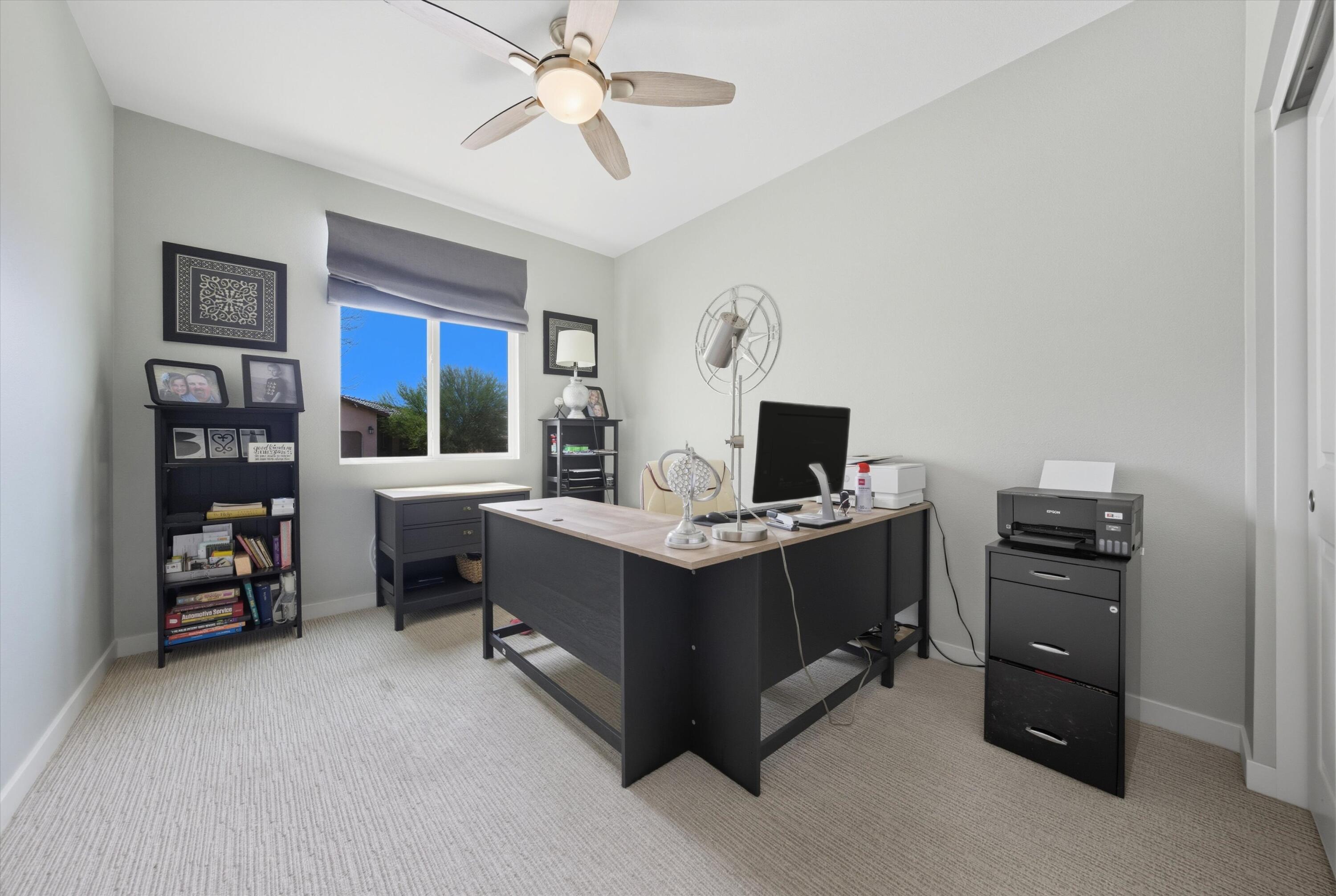 40340 Vivaldi Court Indio, CA 92203 - Photo 25 of 30 a view of a workspace with furniture and cabinet