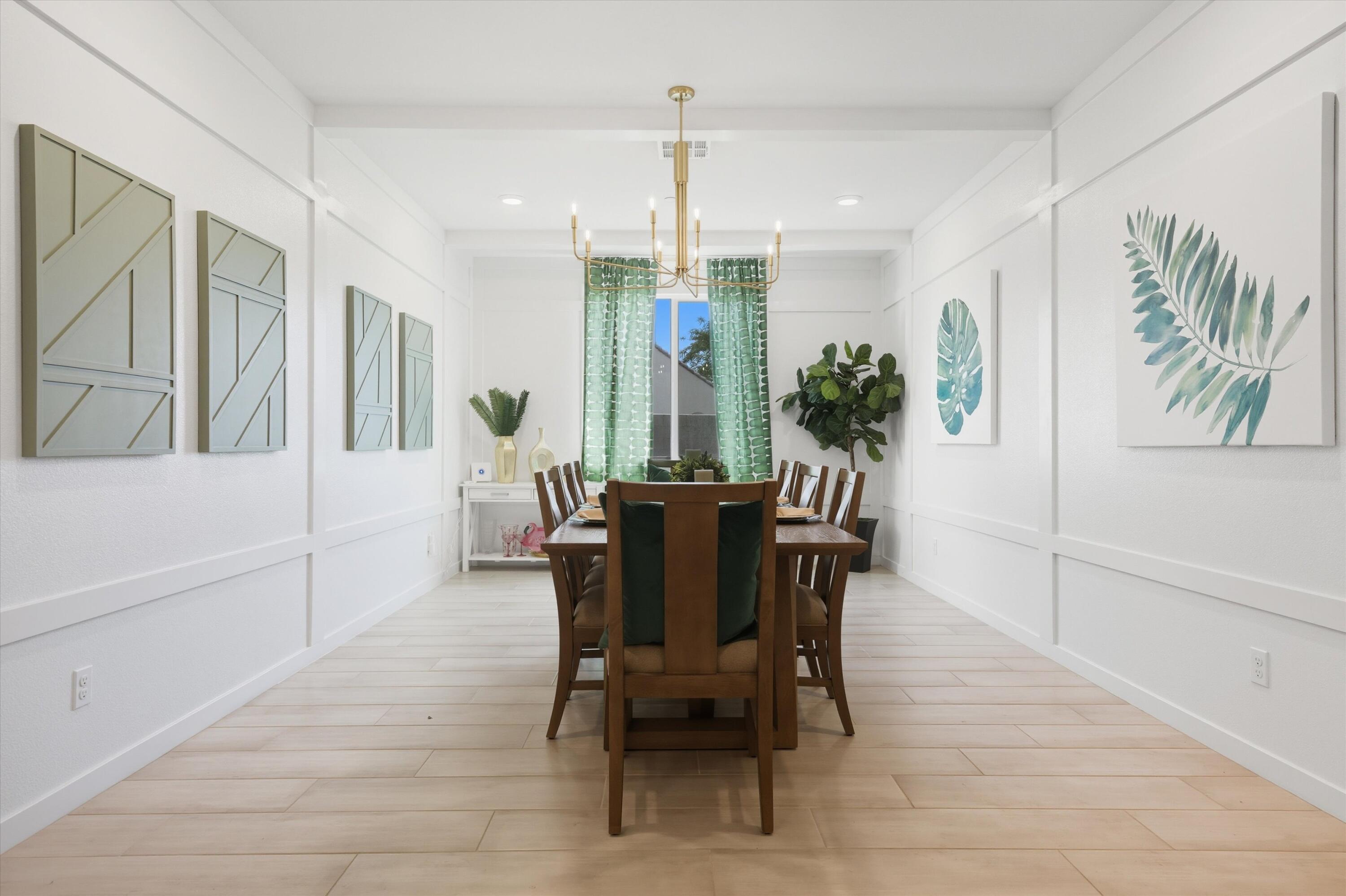 40340 Vivaldi Court Indio, CA 92203 - Photo 3 of 30 a view of a dining room with furniture window and wooden floor