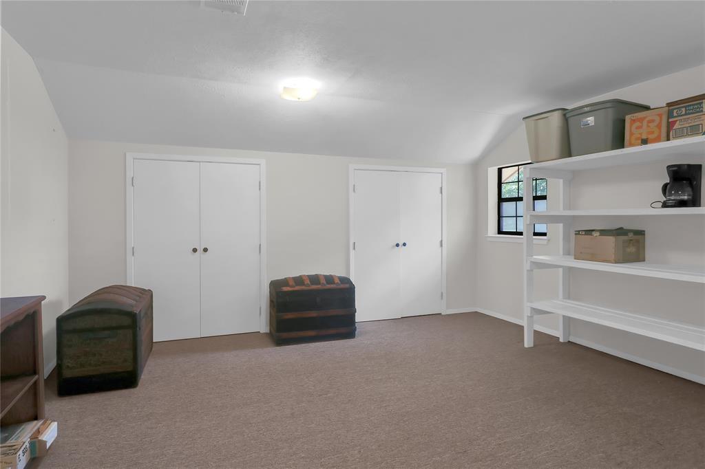 16223 Big Oak Bay Road Tyler, TX 75707 - Photo 30 of 30 Additional upstairs living space featuring lofted ceiling and light colored carpet