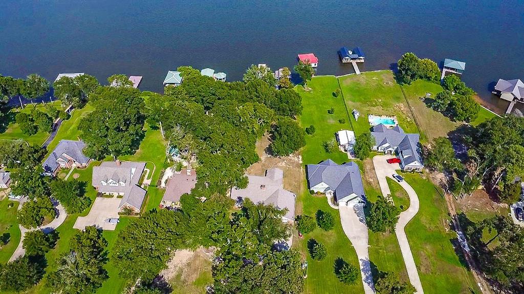 16223 Big Oak Bay Road Tyler, TX 75707 - Photo 5 of 30 Aerial view of residential area with a large body of water
