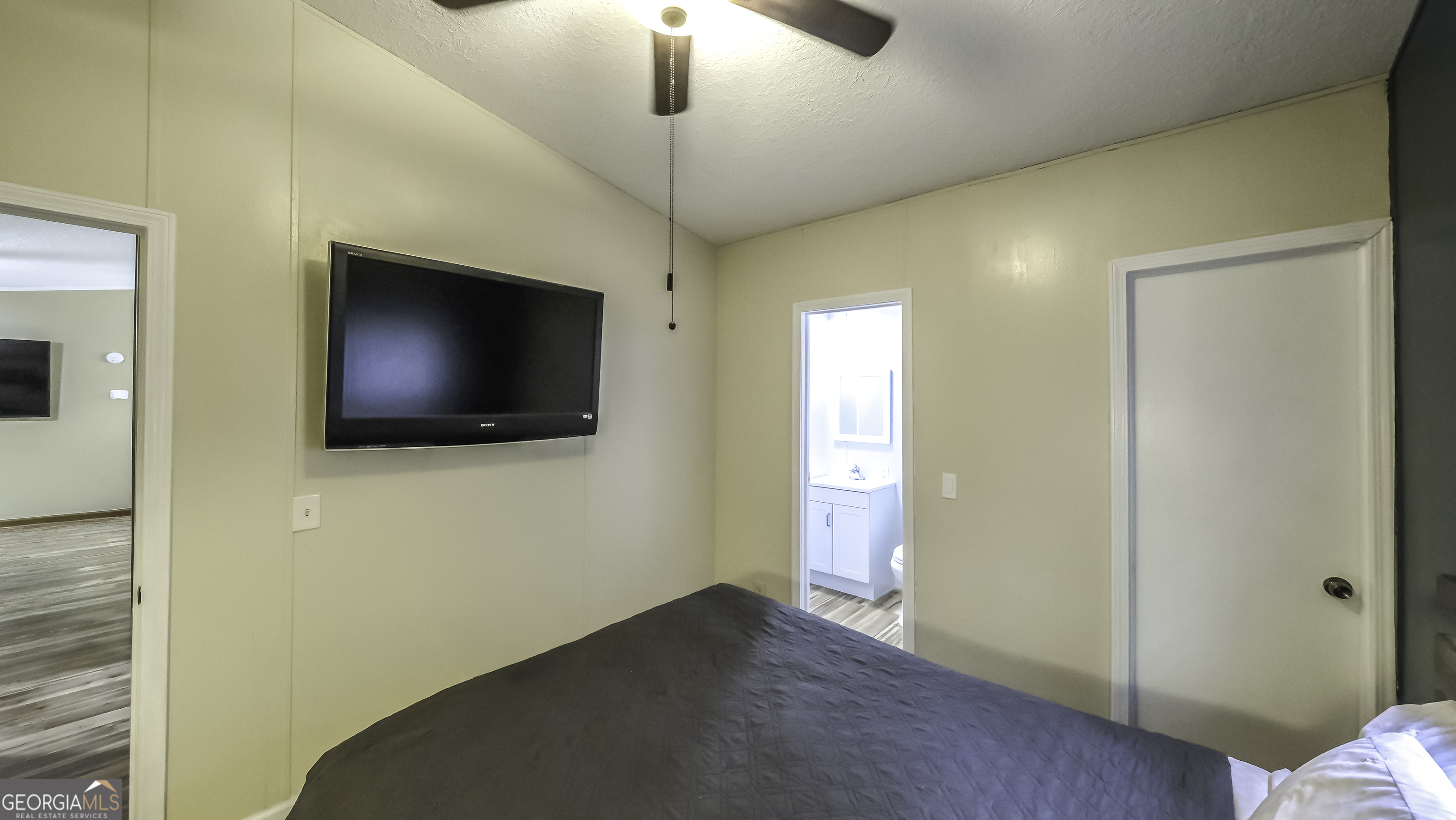 91 Holder Road Temple, GA 30179 - Photo 34 of 40 a view of a livingroom with a flat screen tv