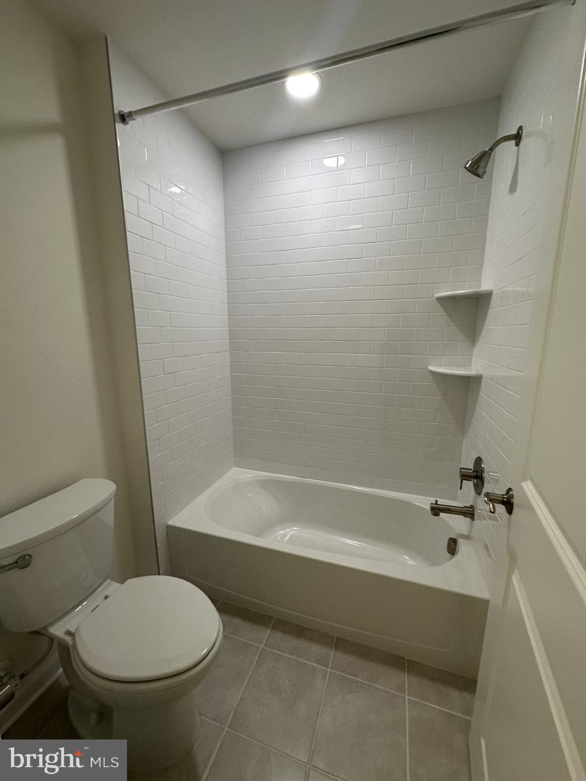 63 Kay Chiarello Way Hamilton, NJ 08690 - Photo 14 of 31 a bathroom with a toilet and a bathtub