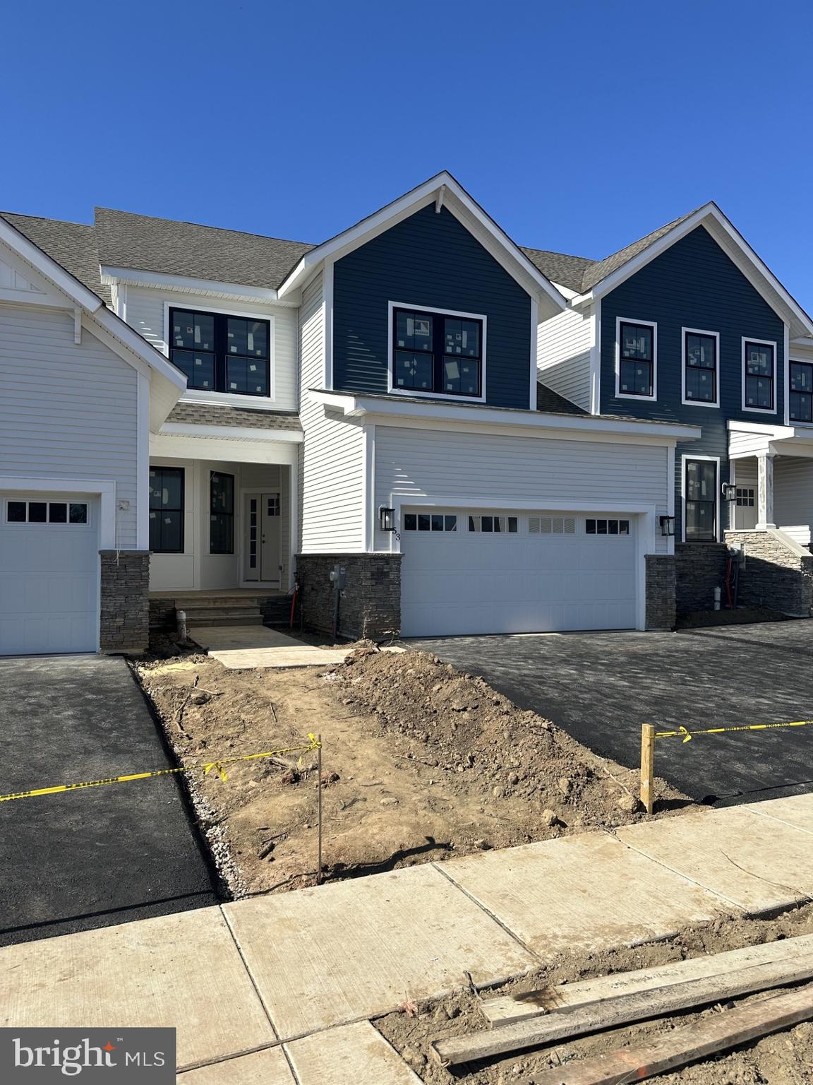 63 Kay Chiarello Way Hamilton, NJ 08690 - Photo 16 of 31 a front view of a house with a yard