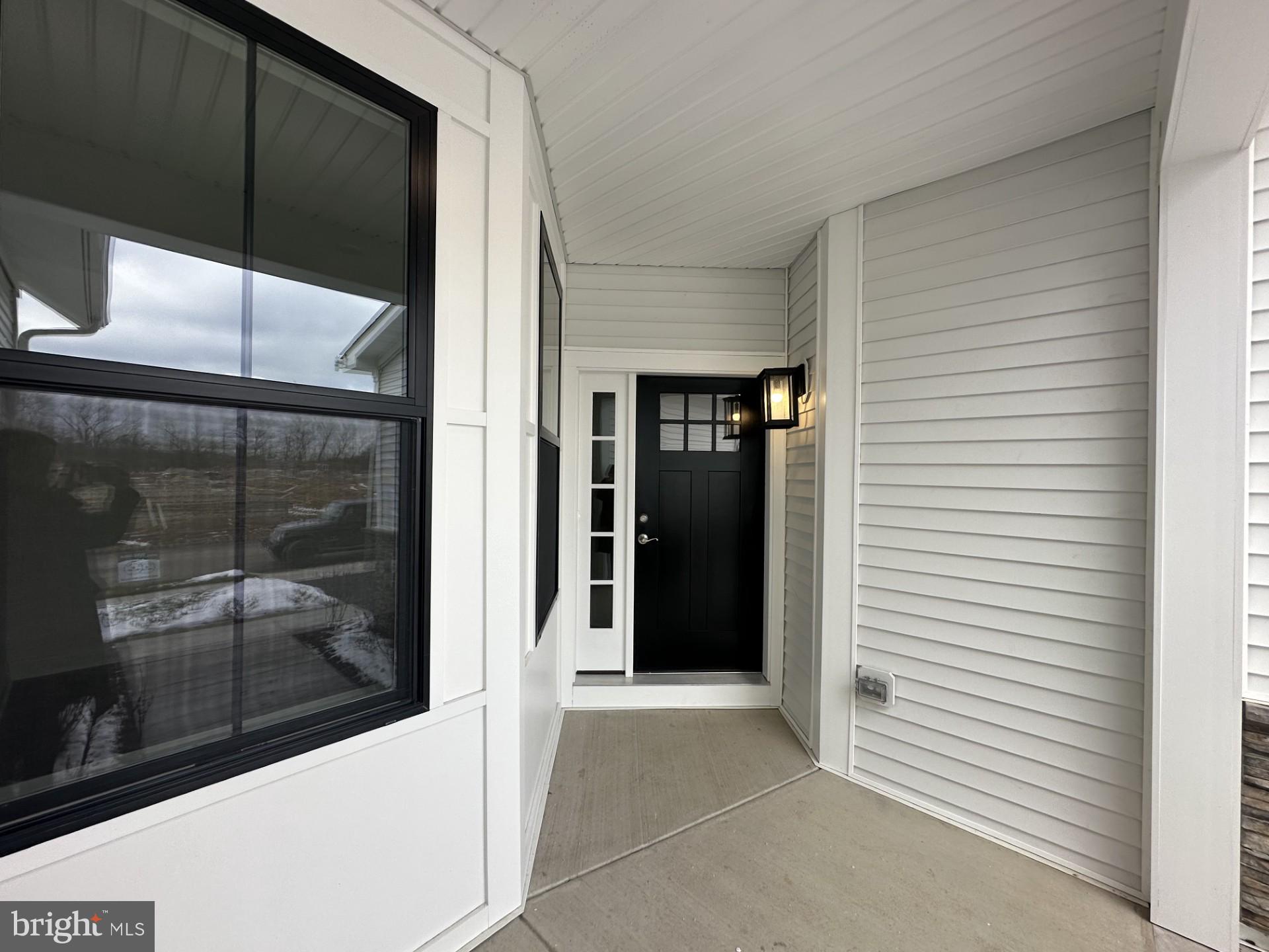 63 Kay Chiarello Way Hamilton, NJ 08690 - Photo 17 of 31 a view of a glass door and a window