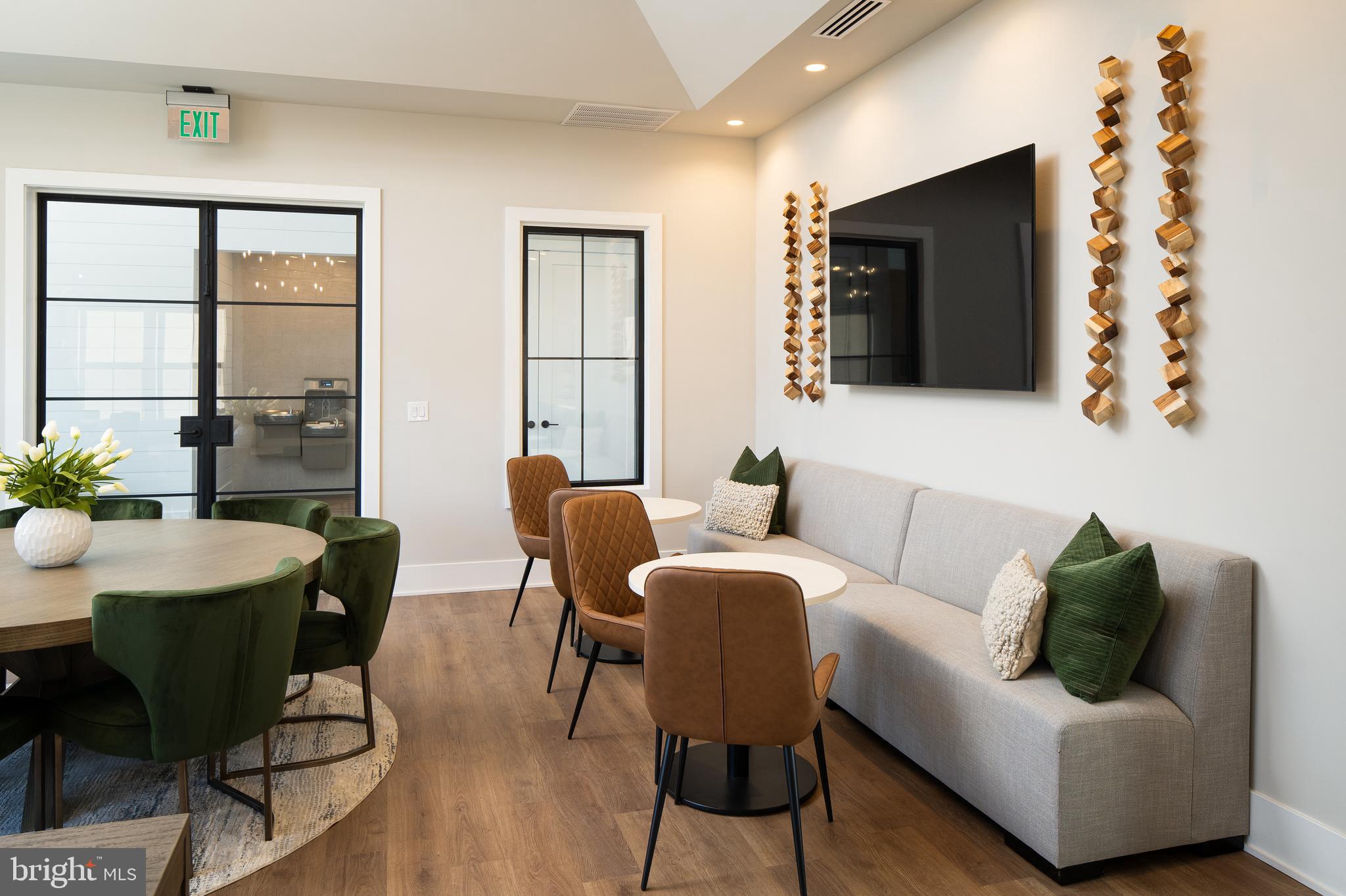 63 Kay Chiarello Way Hamilton, NJ 08690 - Photo 21 of 31 a living room with furniture and a flat screen tv
