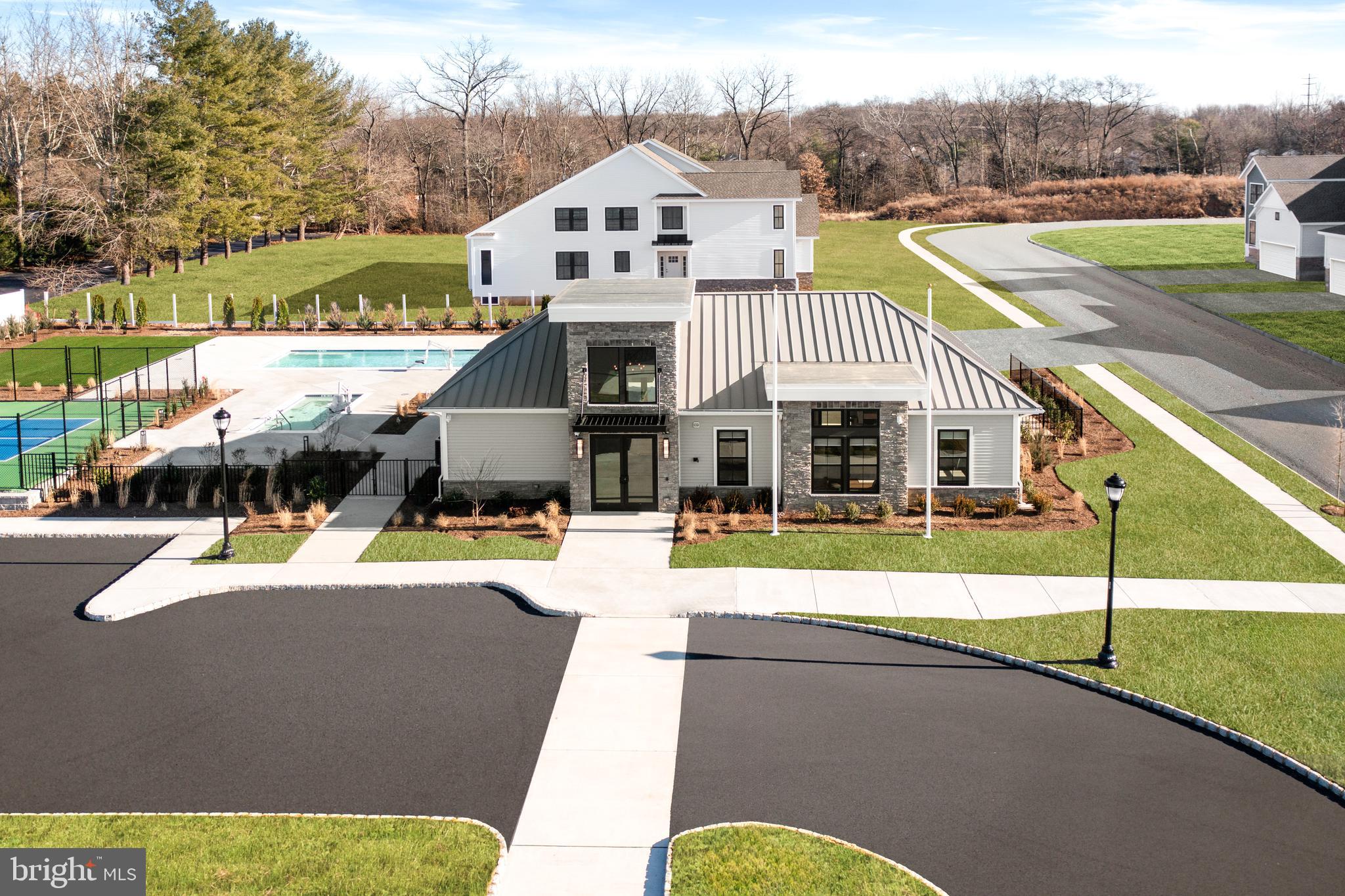 63 Kay Chiarello Way Hamilton, NJ 08690 - Photo 29 of 31 a view of a house with a swimming pool