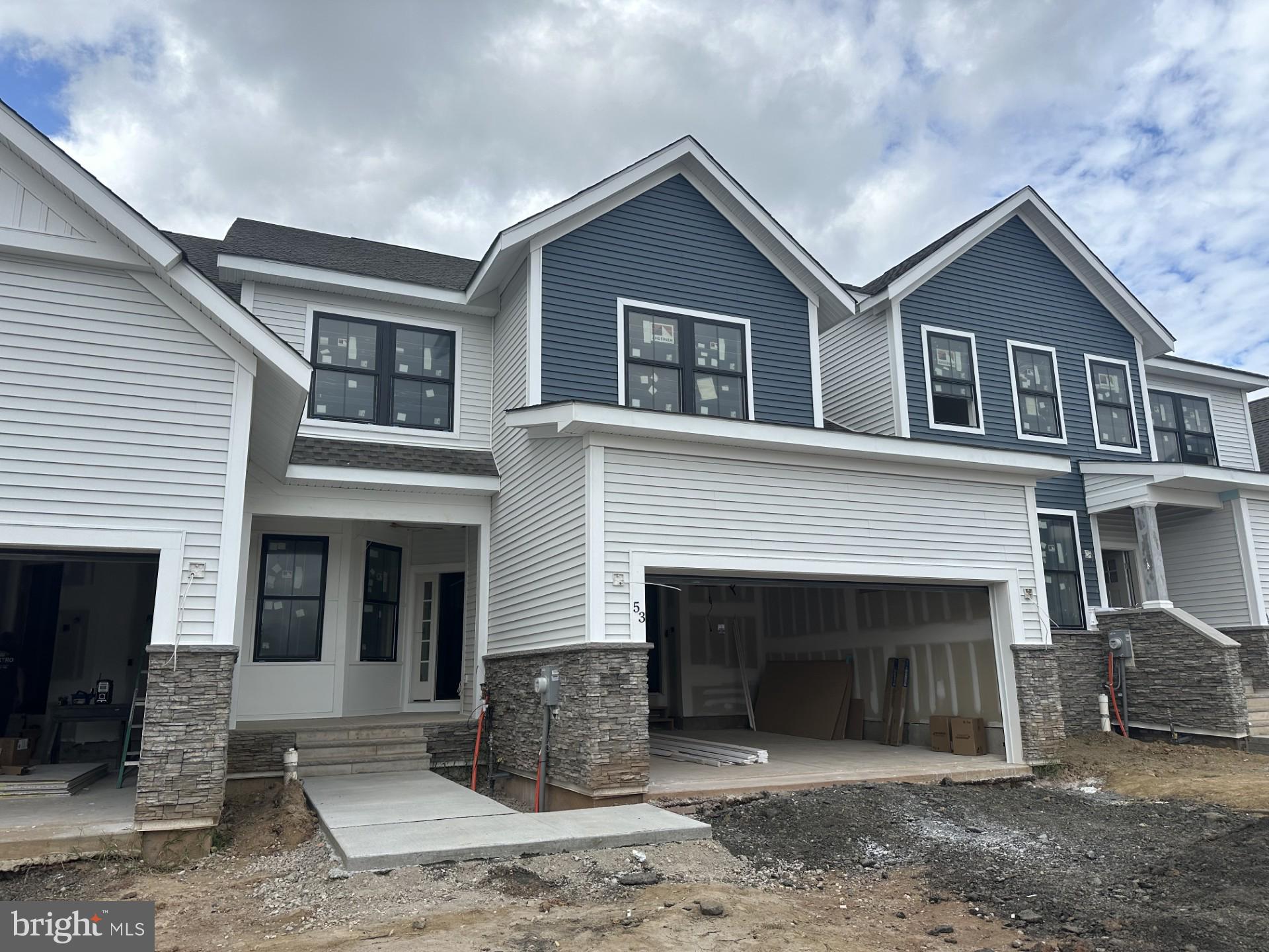 63 Kay Chiarello Way Hamilton, NJ 08690 - Photo 3 of 31 a front view of a house with yard