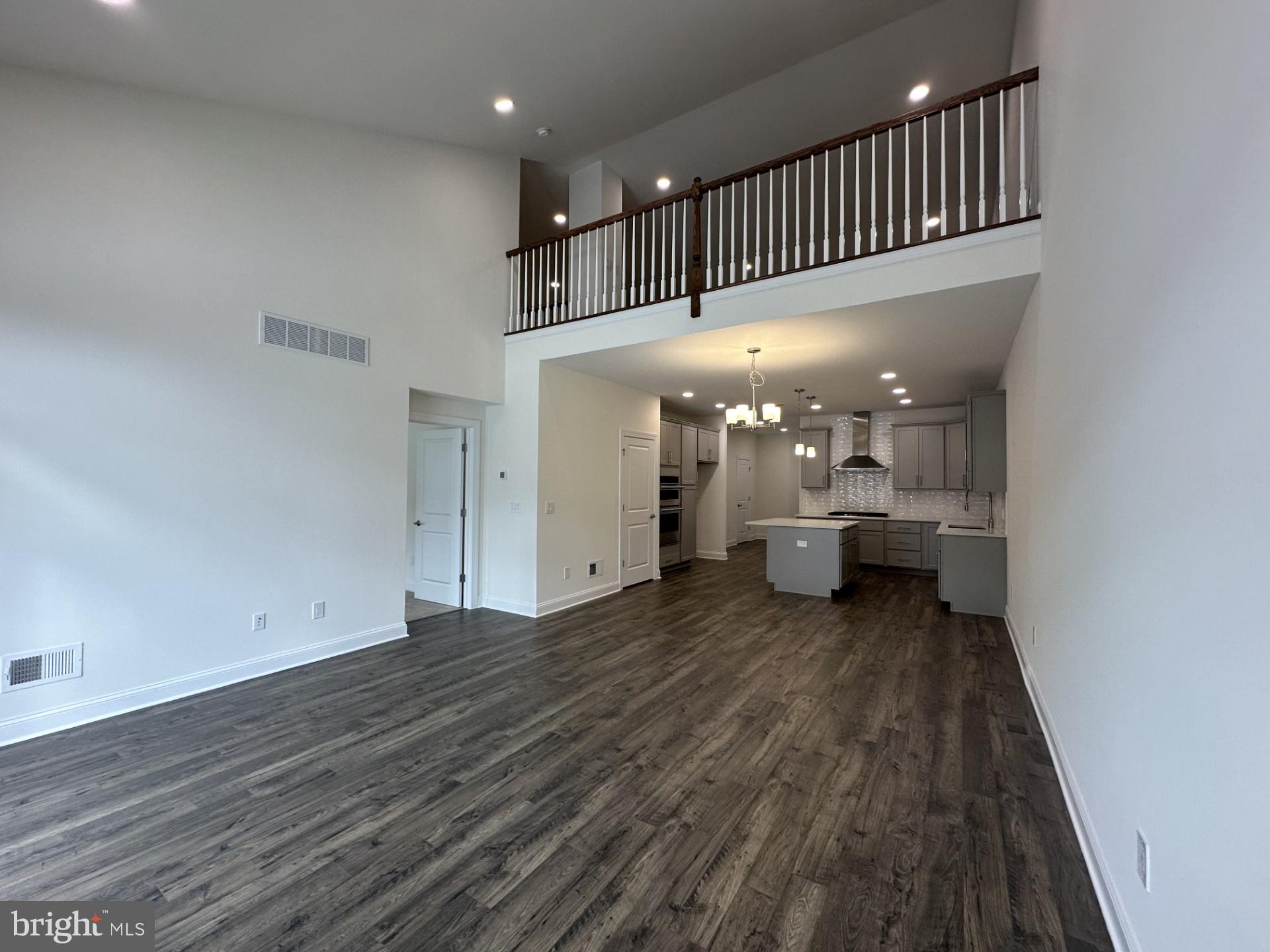 63 Kay Chiarello Way Hamilton, NJ 08690 - Photo 5 of 31 a view of a room with wooden floor