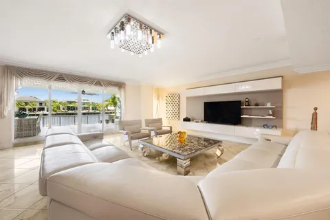 a living room with furniture or couch and a flat screen tv