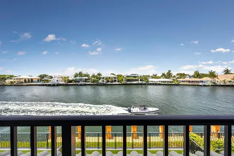 a view of a lake from a balcony