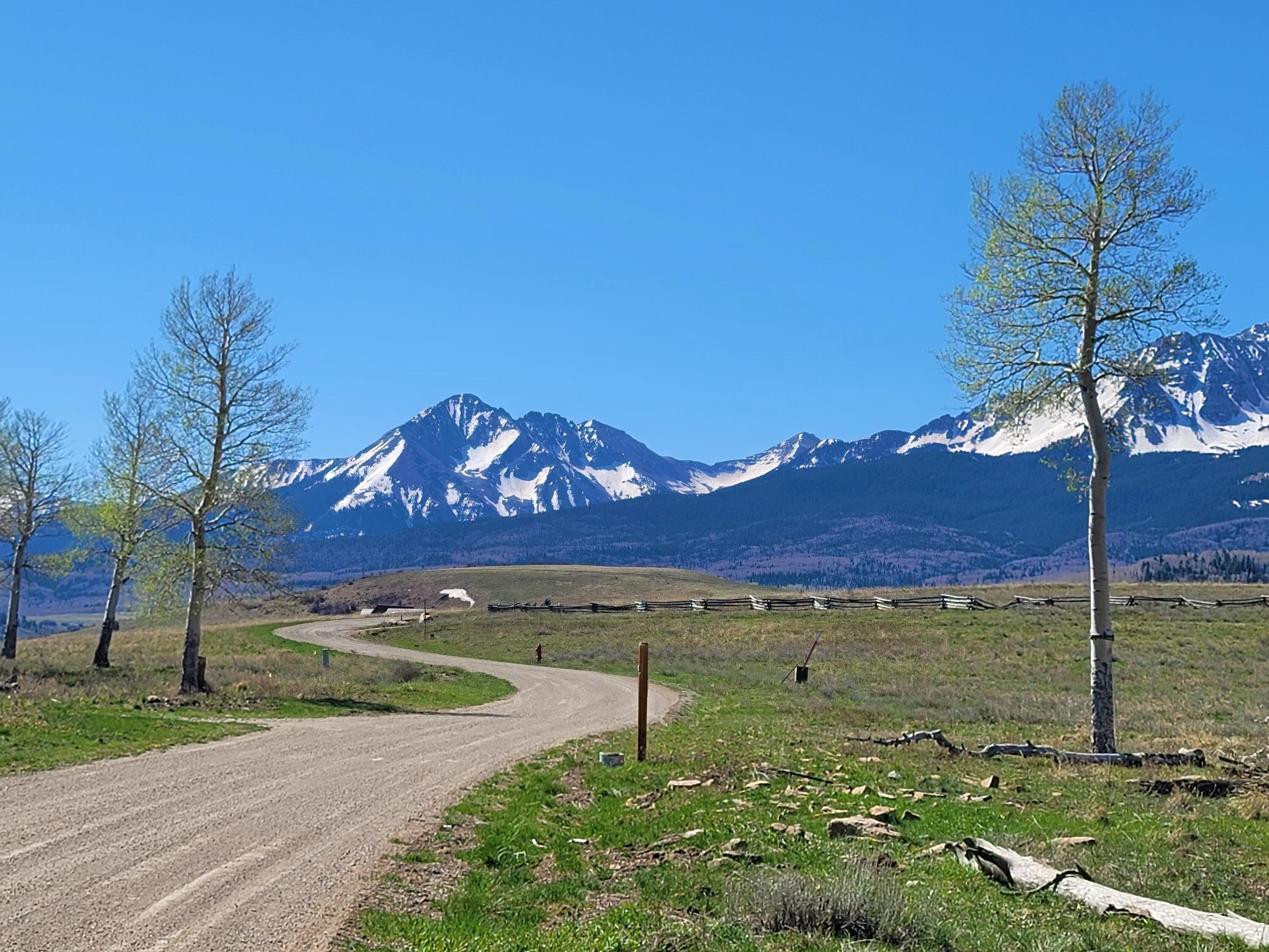 a view of a barn with a yard