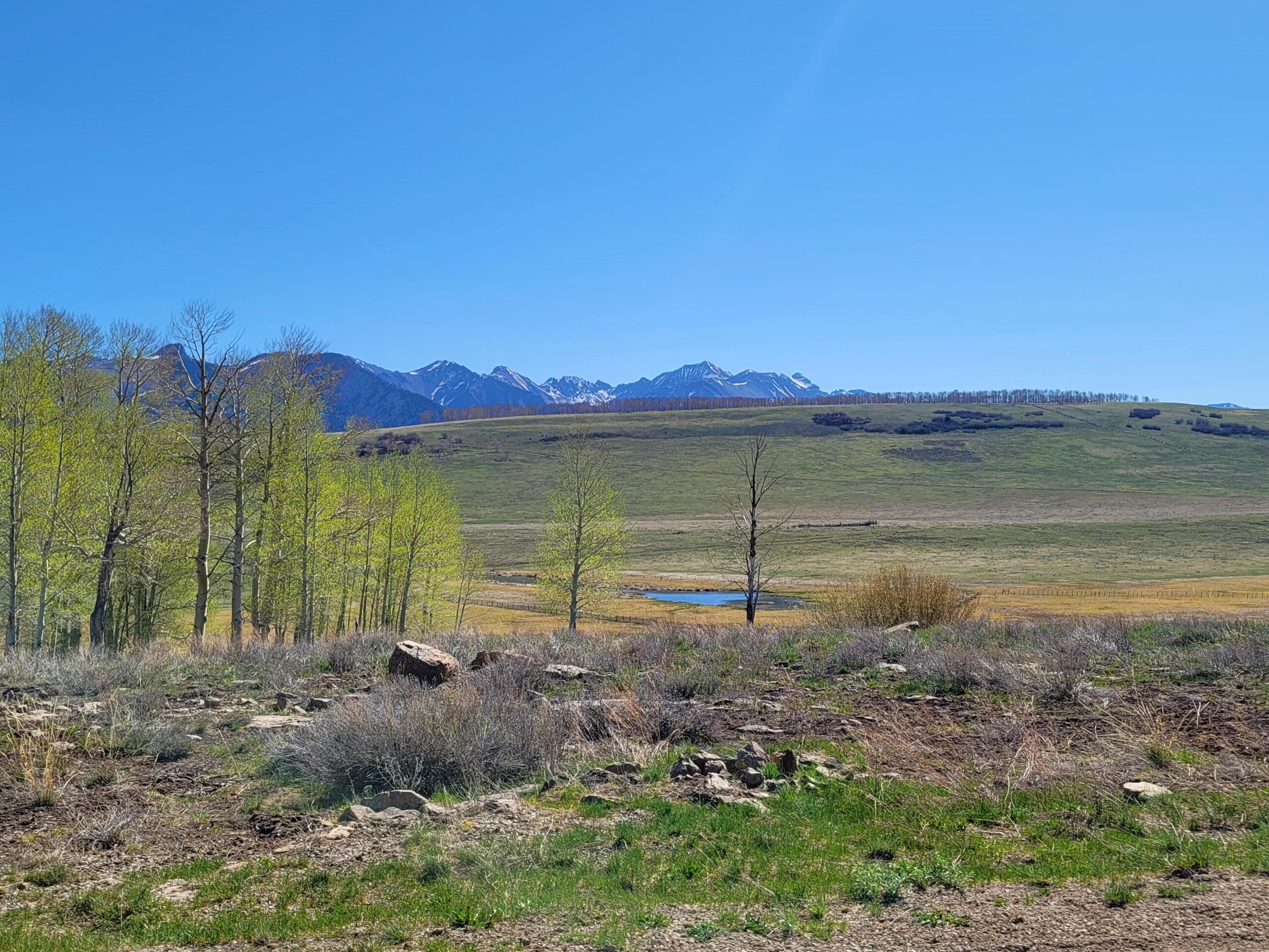 Tbd Lot 88 East Anderson Road Placerville, CO 81430 - Photo 9 of 11 a view of a lake with a mountain in the background