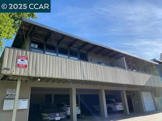 a view of car parked in front of building