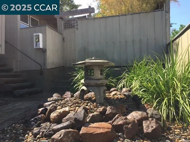 a view of backyard of a house