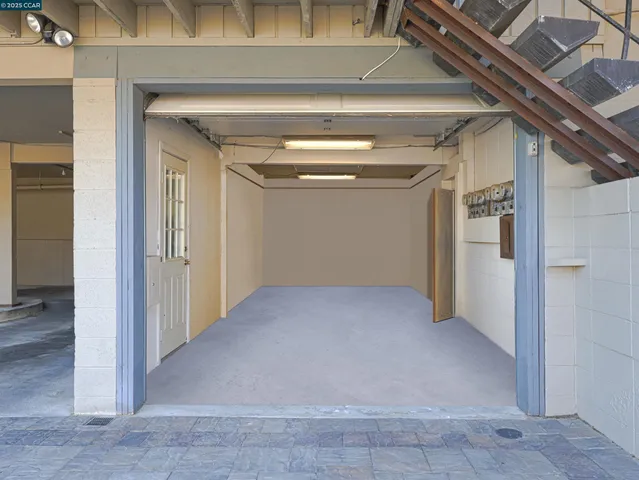 a view of a car park in front of house