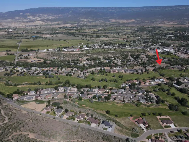 an aerial view of a city with lots of residential buildings