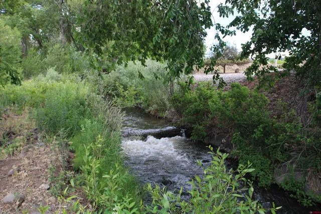 a view of an outdoor space with a lake view