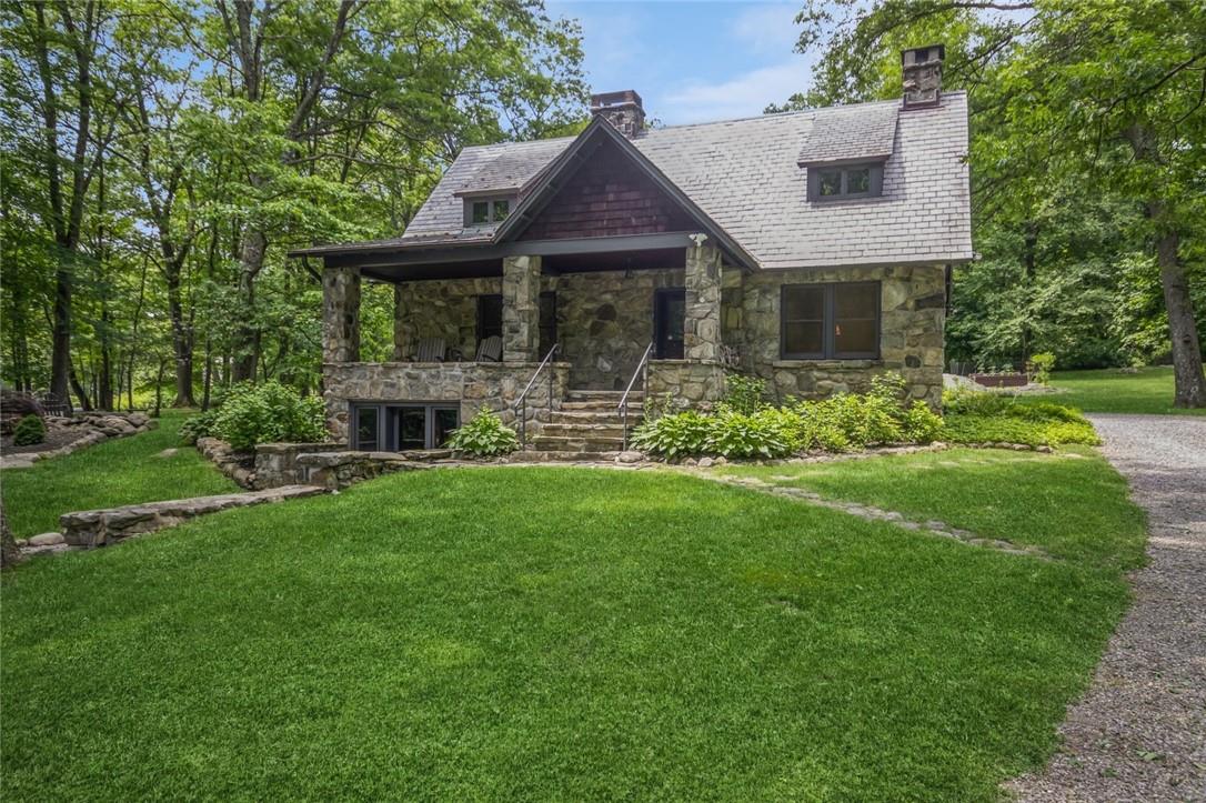 105 Travis Corners Road Garrison, NY 10524 - Photo 1 of 1 View of front of house with a front lawn