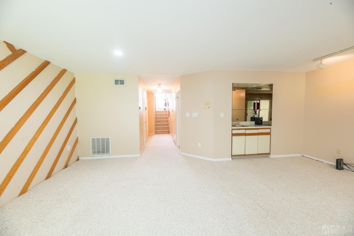 4602 Stonehedge Road Edison, NJ 08820 - Photo 22 of 87 a view of empty room with kitchen