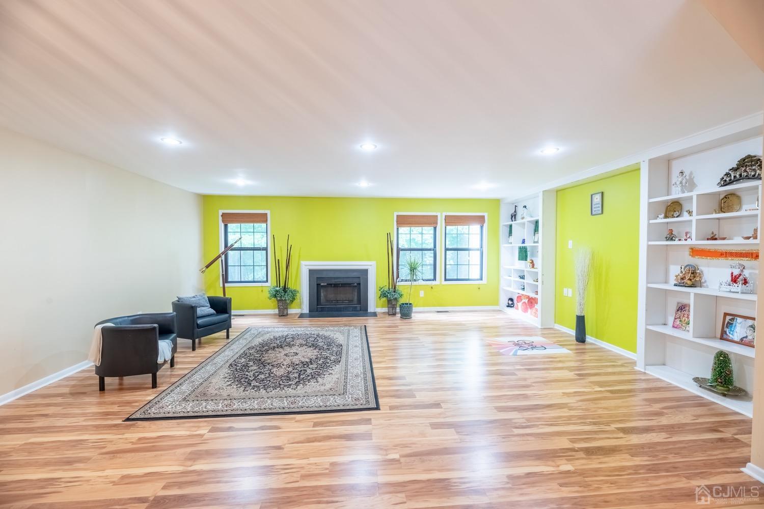 4602 Stonehedge Road Edison, NJ 08820 - Photo 33 of 87 a living room with furniture and a wooden floor