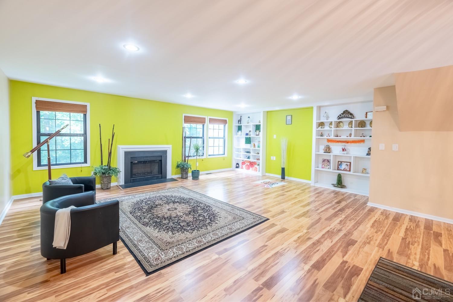 4602 Stonehedge Road Edison, NJ 08820 - Photo 34 of 87 a living room with couch and a flat screen tv
