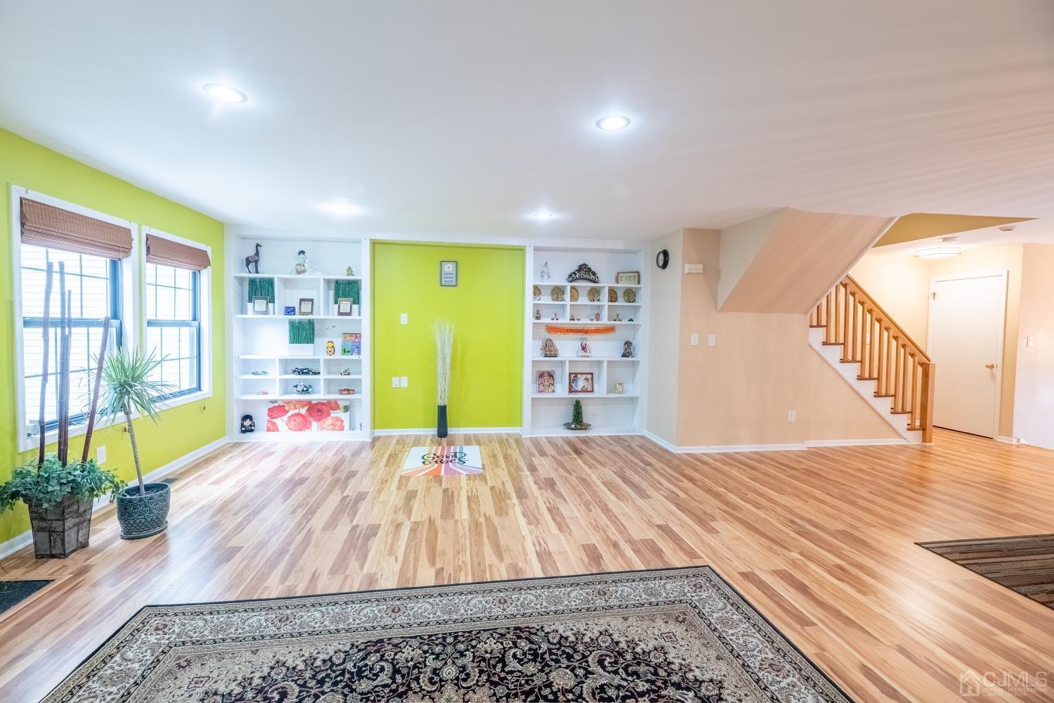 4602 Stonehedge Road Edison, NJ 08820 - Photo 35 of 87 a room with a bed and a wooden floor