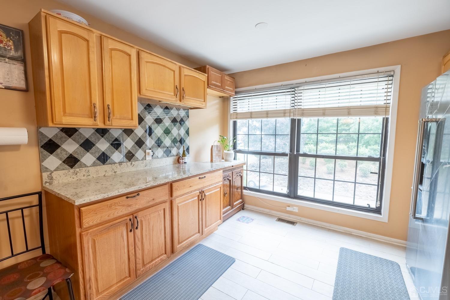 4602 Stonehedge Road Edison, NJ 08820 - Photo 40 of 87 a large kitchen with a large window