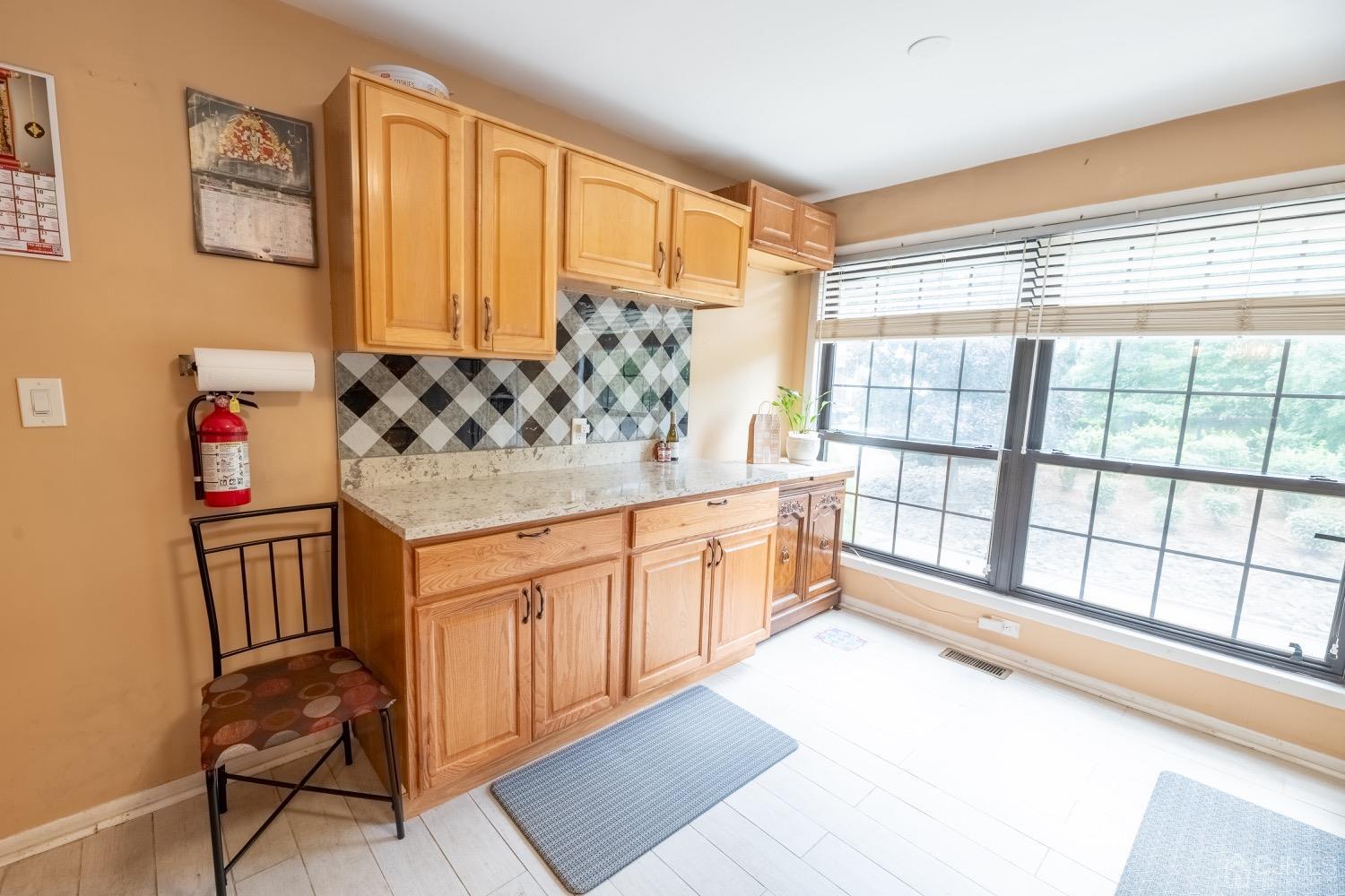 4602 Stonehedge Road Edison, NJ 08820 - Photo 45 of 87 a spacious bedroom with a large bed and a window