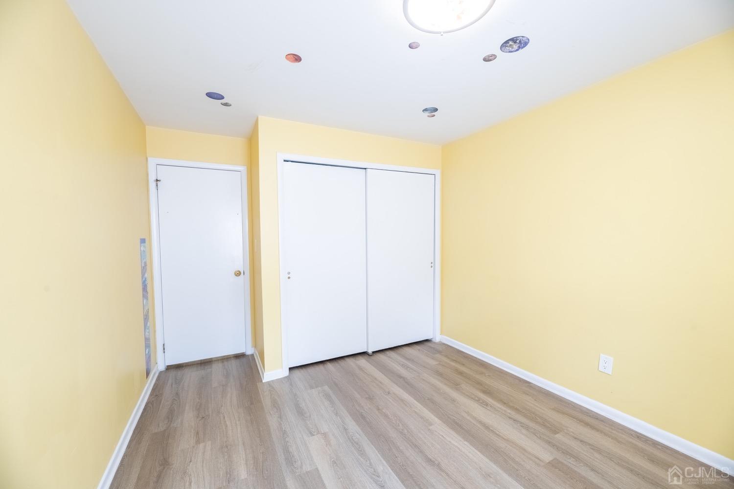 4602 Stonehedge Road Edison, NJ 08820 - Photo 63 of 87 a view of hallway with wooden floor