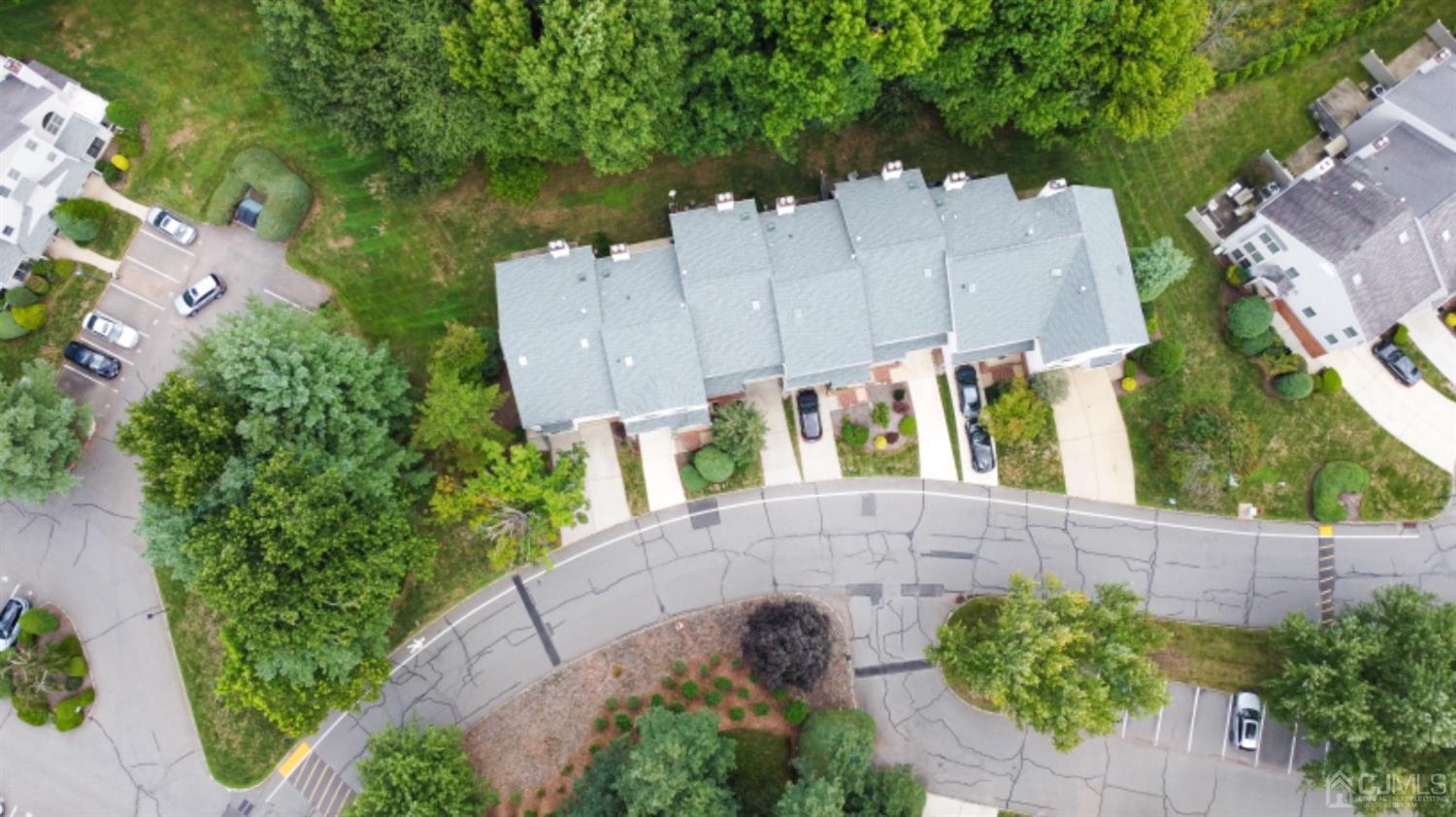 4602 Stonehedge Road Edison, NJ 08820 - Photo 86 of 87 an aerial view of a house with a yard and garden