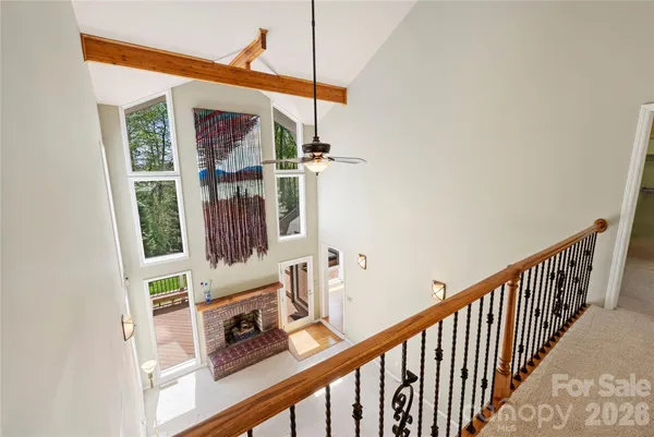 a view of a balcony with furniture