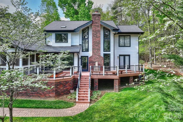 a house view with a garden space