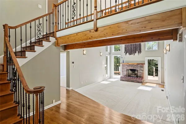 a view of a hallway with staircase
